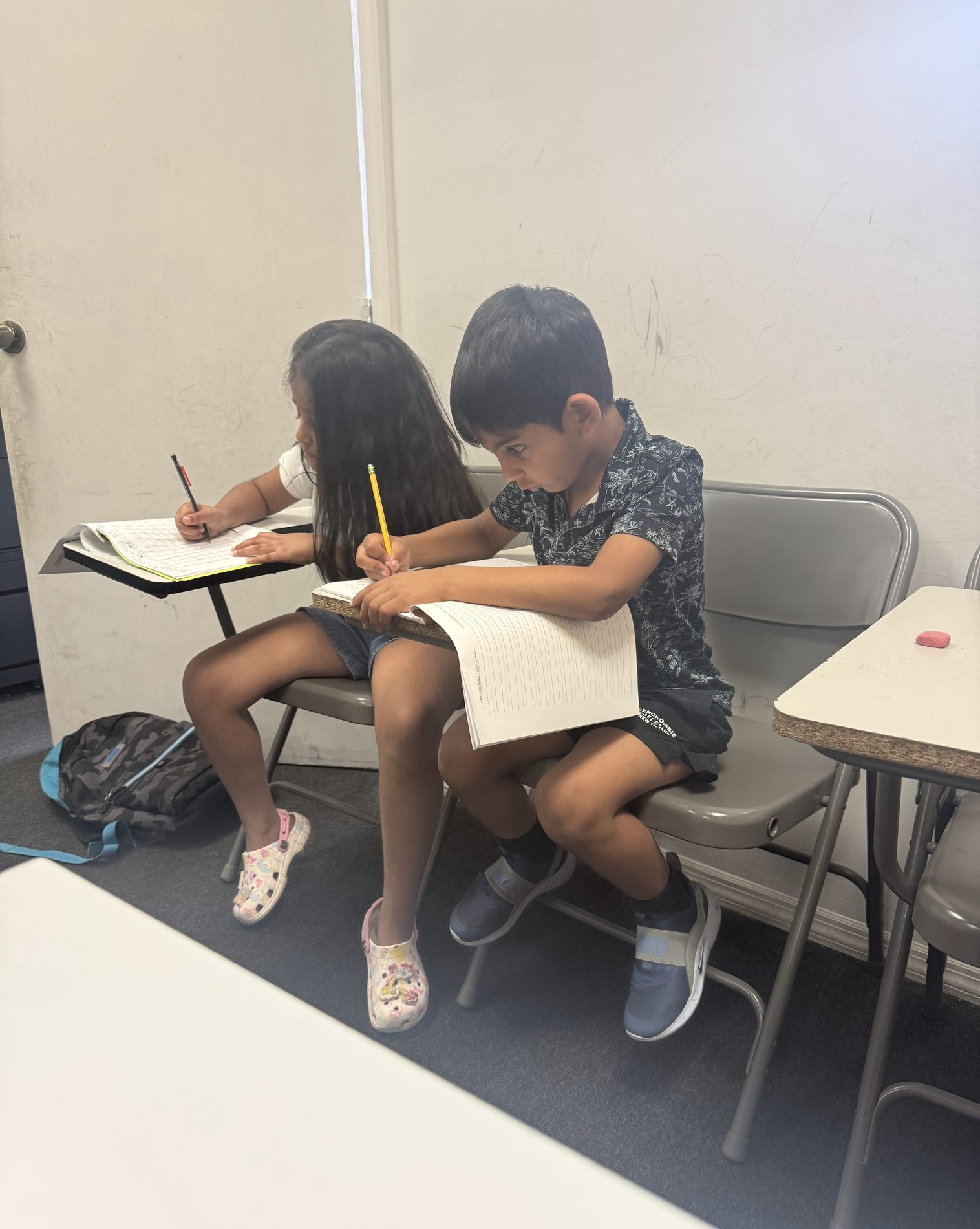 Students at SNR Tutors focused on their lesson